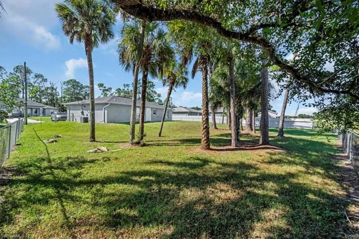 View of fenced backyard