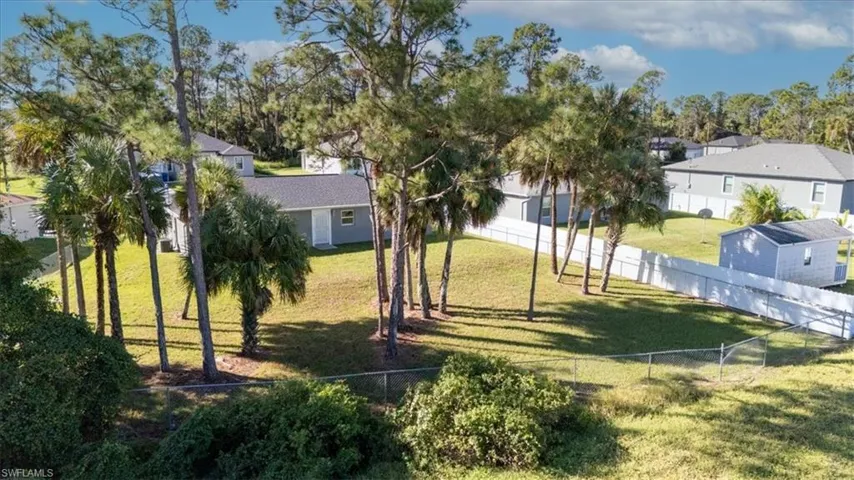 View of fenced backyard