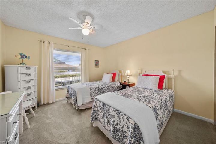 Guest bedroom, South facing impact window