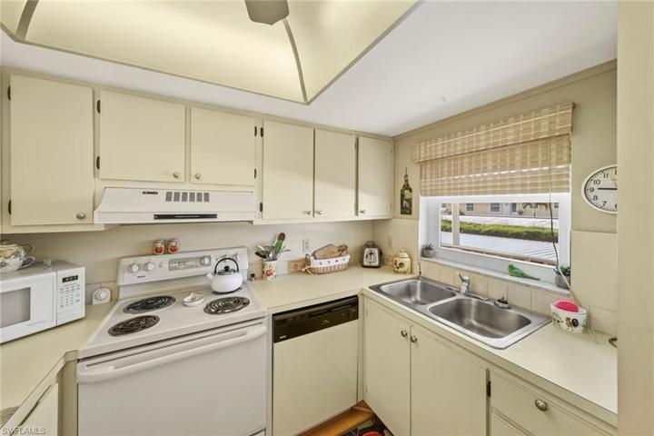 Kitchen with double sink and South facing impact window