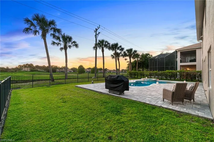 Huge paver lanai with plenty of yard space