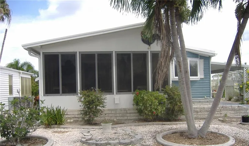 View of property exterior featuring a patio area