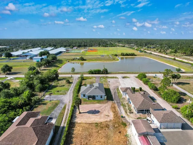 Bird's eye view with a residential view and a water view