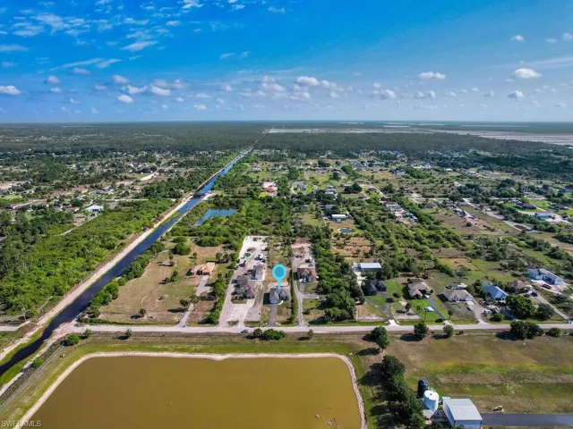 Bird's eye view featuring a residential view and a water view
