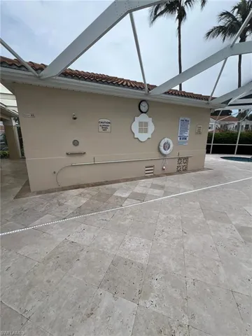 View of patio / terrace featuring glass enclosure