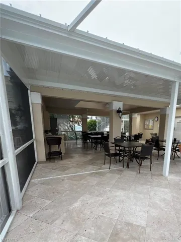 View of patio with outdoor dining space