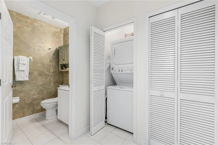 Stack washer/dryer right outside the 2nd full bath and 2nd bedroom.