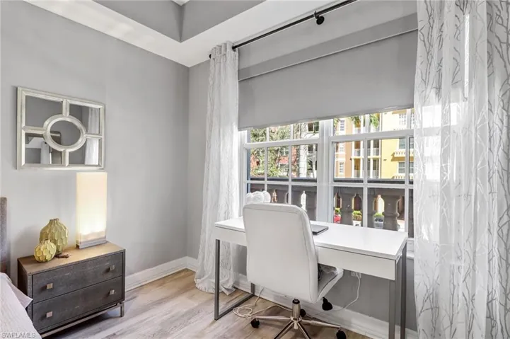 Office area featuring light hardwood / wood-style floors