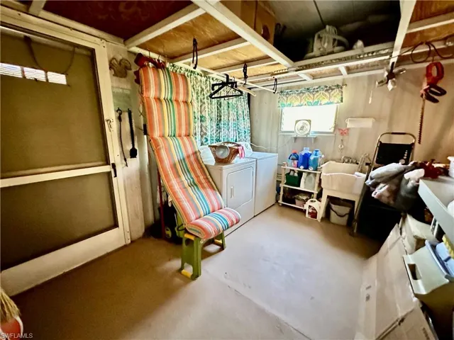 Inside Utility Room w/Washer, Dryer & Storage Area