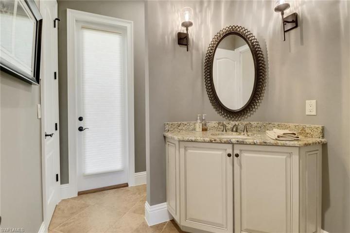 Guest bathroom also doubles as pool bath.