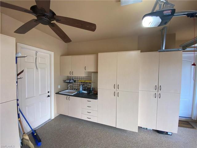 Sink and work area with storage cabinets