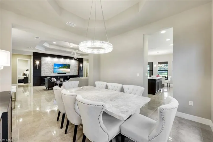 Arhaus Dining Set with Restoration Hardware Chandelier in Dining Room