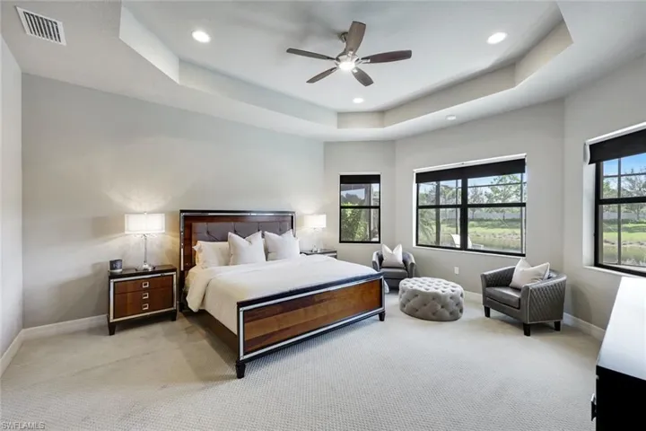 Master bedroom with Coffered Ceiling and Sitting Area