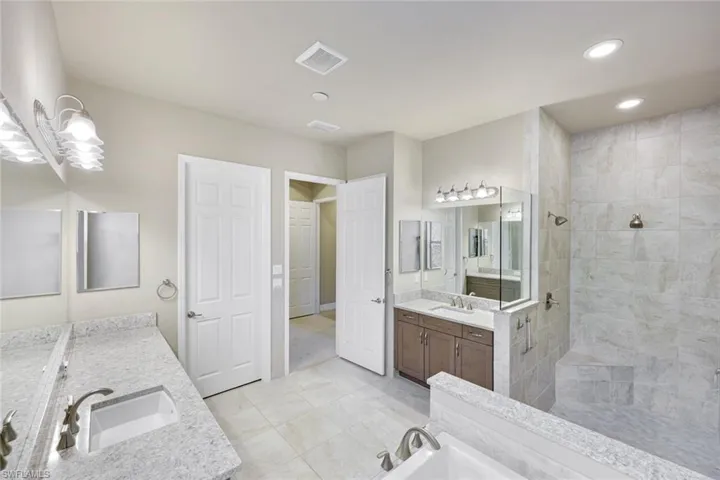 Luxurious Master Bath with Custom Finishes and Extended, Oversized Shower and Tub