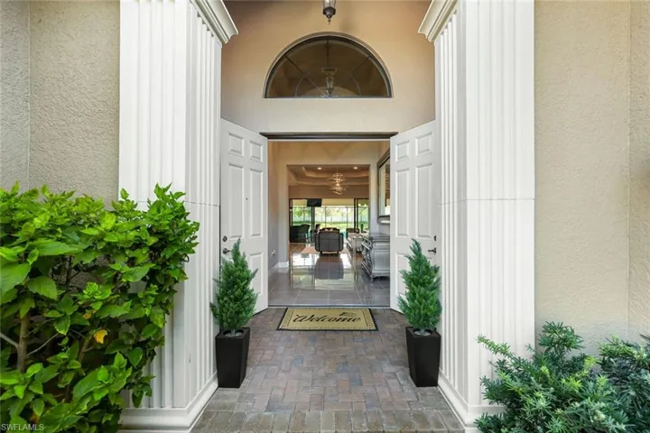 22" Grande Entrance with French Doors, Columns and Lush Landscaping