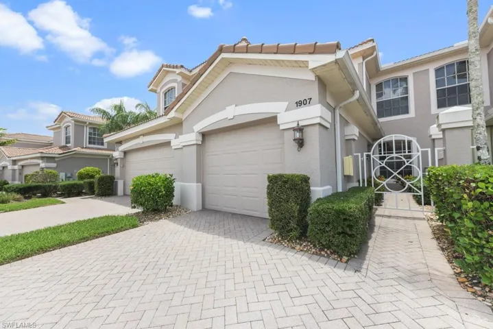 View of property with a single car garage