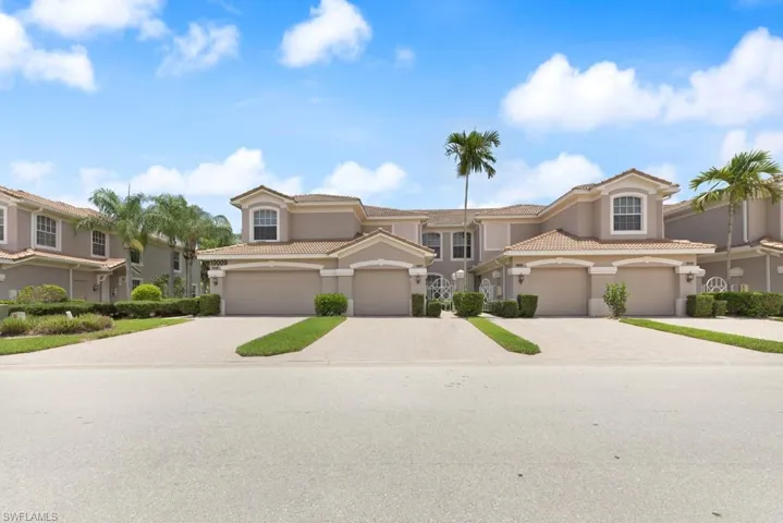 Mediterranean / spanish-style house with a garage