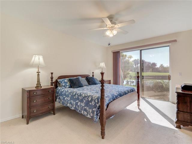 Master bedroom with view of water and golf course
