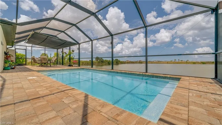 extended Paver pool area screened with lake view -fresh water canal