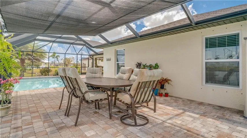 extended Paver pool area screened with lake view -fresh water canal