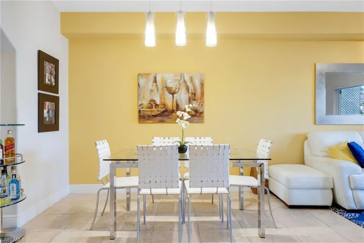 Dining space with tile patterned flooring