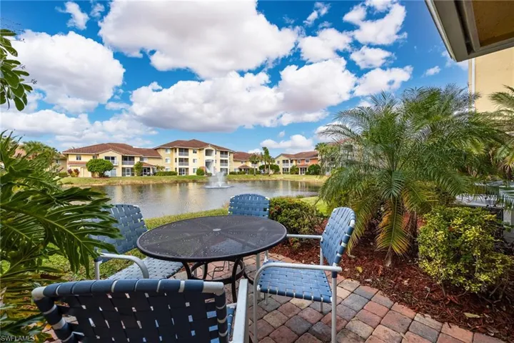 View of patio with a water view