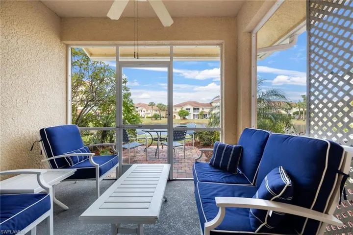Sunroom featuring ceiling fan