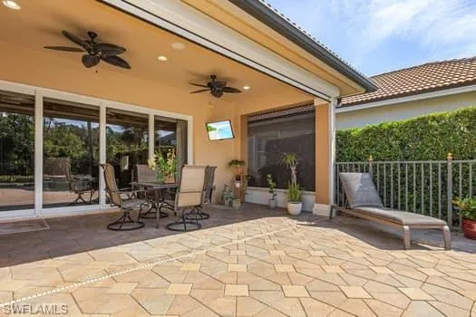 View of patio with ceiling fan