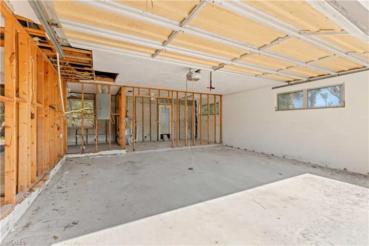 Basement featuring water heater