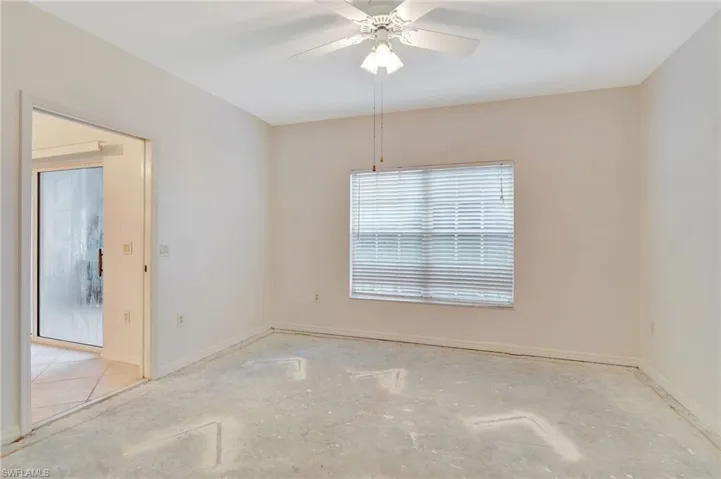 Empty room featuring ceiling fan