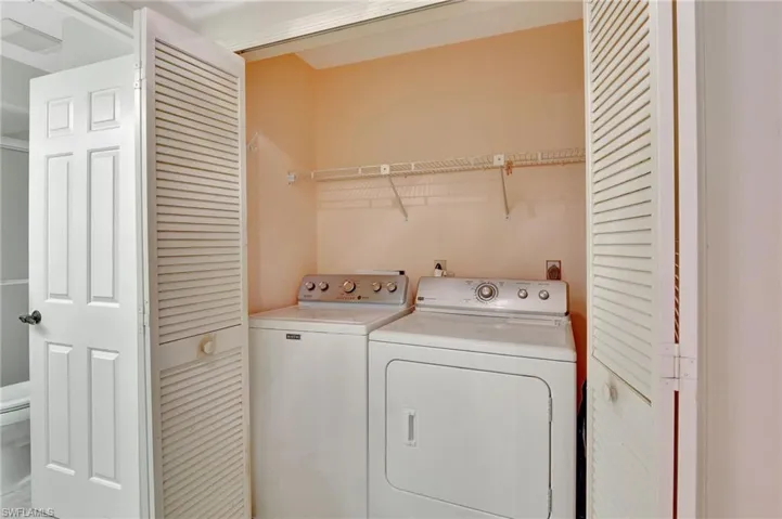 Laundry area featuring washing machine and dryer