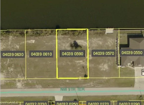 Aerial map of property and surrounding area with property parcel outlined