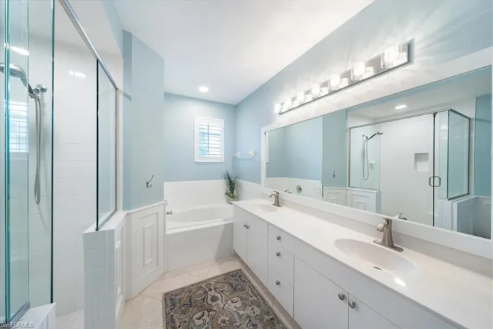 Primary Bathroom with separate shower, soaking tub and dual sinks