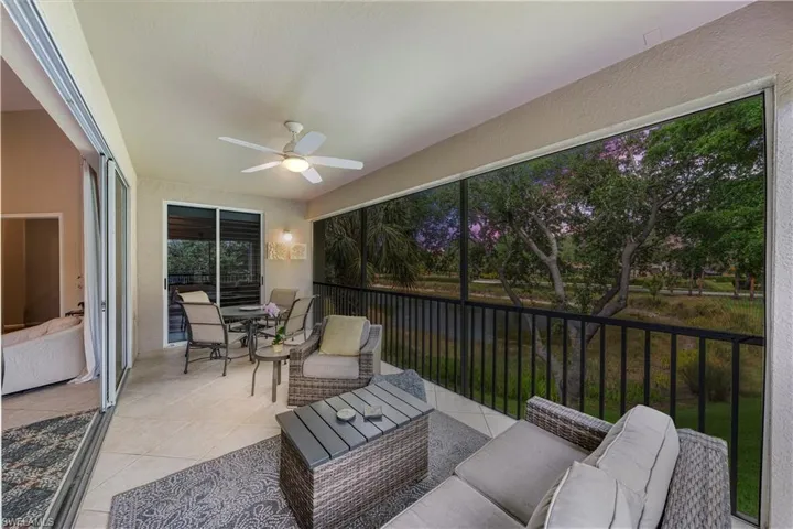 Indoor space opens to welcoming screened balcony