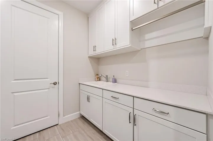 Laundry with upgraded sink and cabinetry