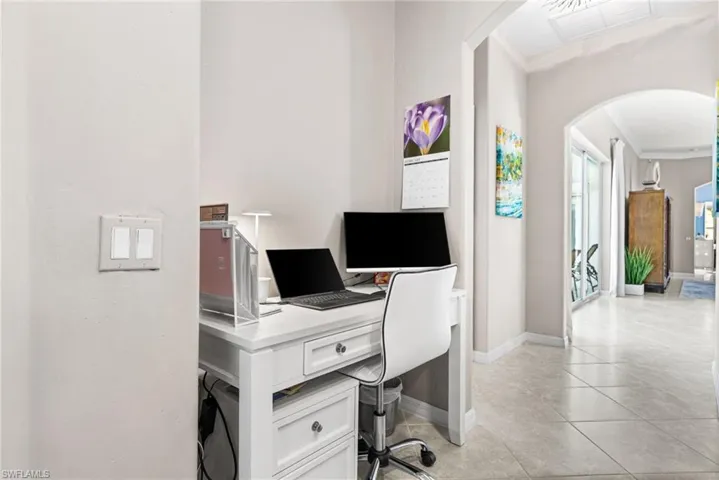 This nook across from the kitchen has many uses!! Office/hobby/sewing area.