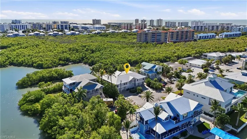 View of urban area with a nearby body of water - Virtually Edited Image