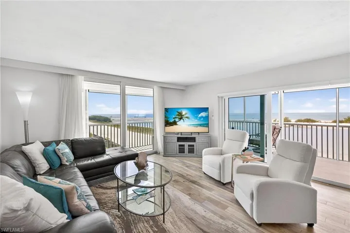 Amazing open living area and the wrap around lanai -image may have been digitally enhanced