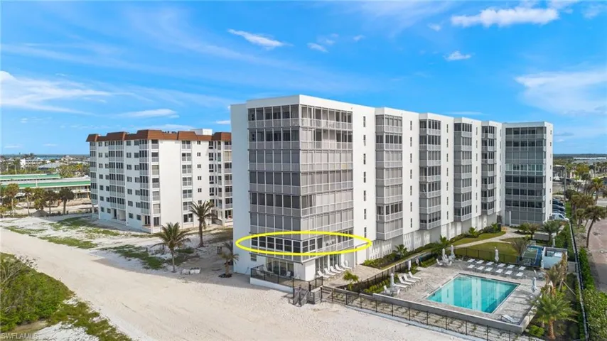 The condo is as wide as the building, complete beach vibe.
