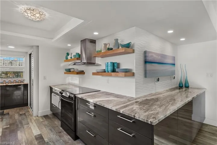 European style cabinets along with granite countertops