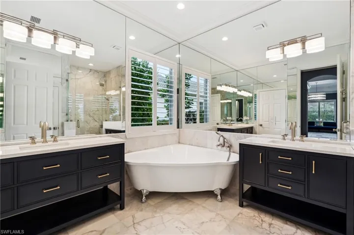 Primary bathroom with separate shower and tub.