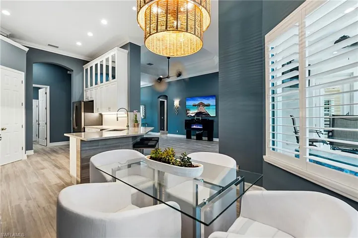 Kitchen dining area featuring a wealth of natural light.