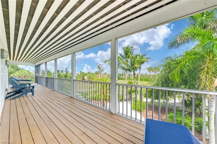 1st floor Deck with a sunroom