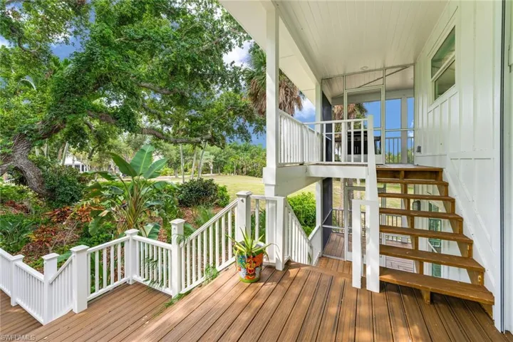 Wooden deck featuring stairs