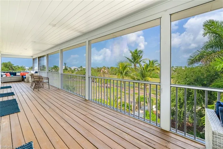2nd floor Deck featuring a sunroom and an outdoor hangout area