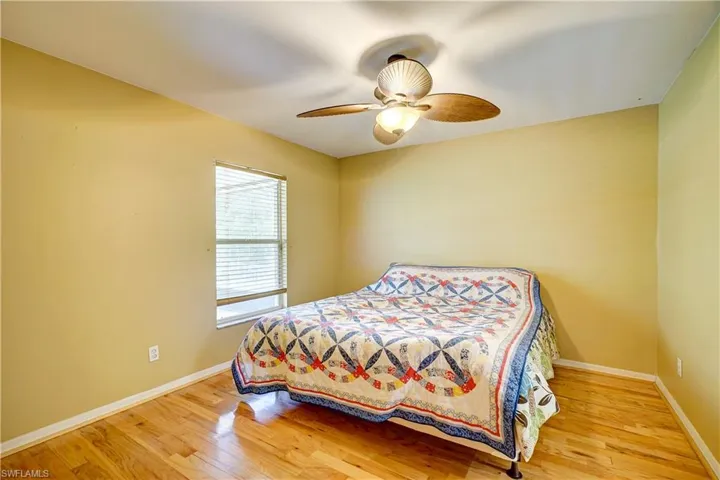 The master bedroom with beautiful hardwood floors