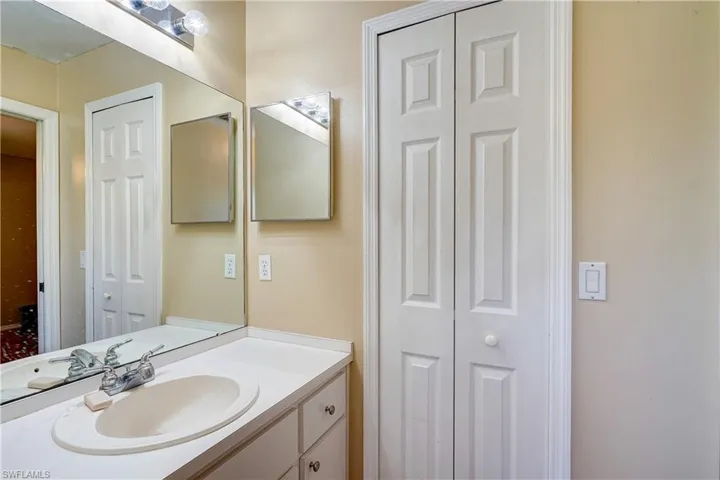 Master bathroom with linen closet
