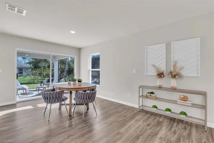 Dining space featuring hardwood / wood-style flooring