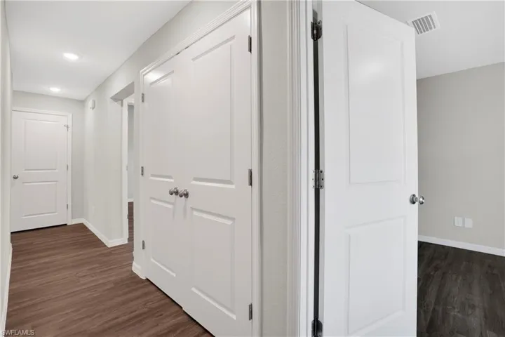 Bedroom Hall featuring Laminate wood-type flooring