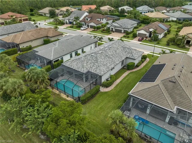 Aerial view of residential area with a pool